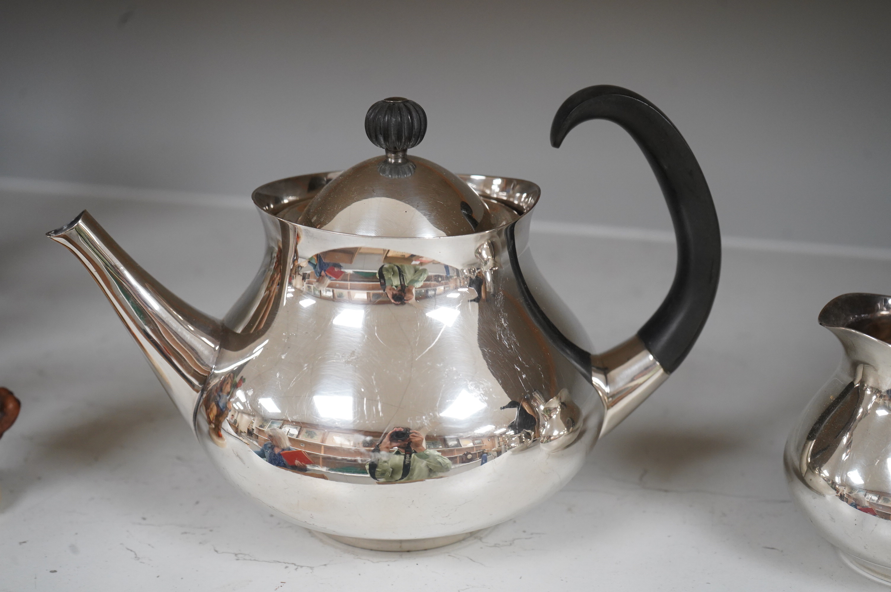 Eric Clements (1925-2019) a four piece plated tea set, c.1960, Embassy plate by M&W England, water jug and cover, 19.5cm high
